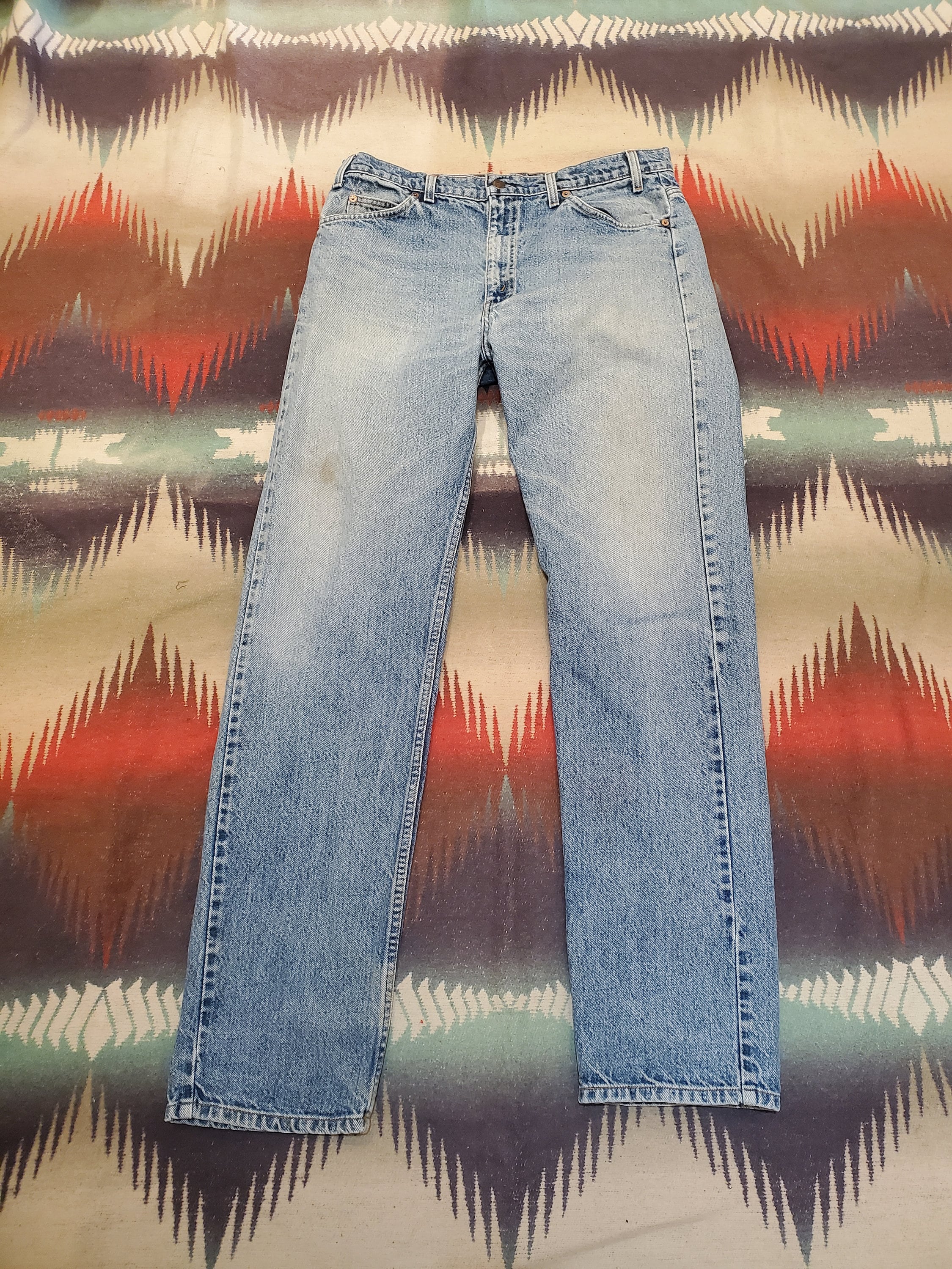 1990s Levi's 505 Orange Tab Blue Denim Jeans Size 34x33 – People's Champ  Vintage