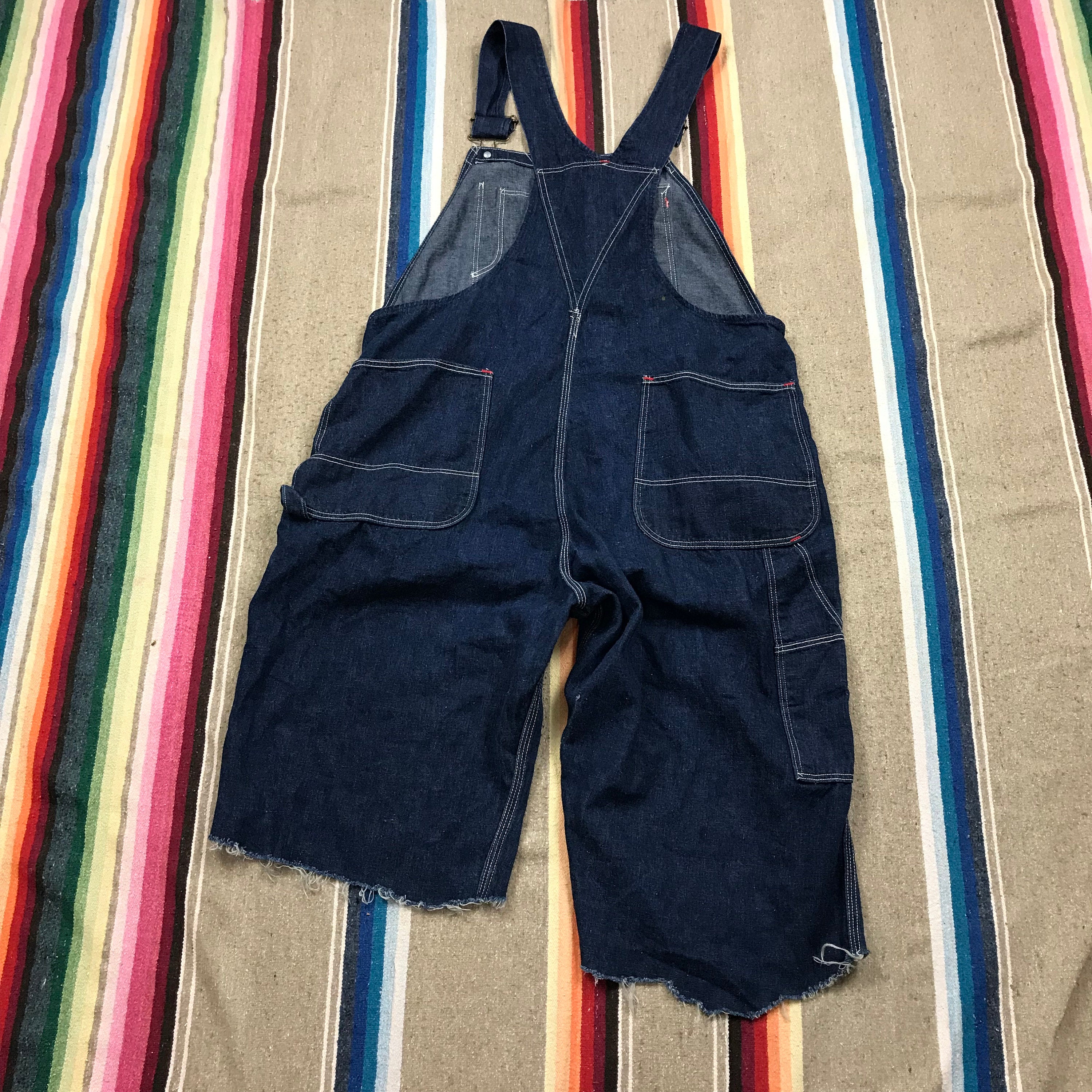 Dark blue denim store overalls